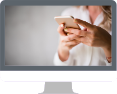 A computer screen showing someone using a phone
